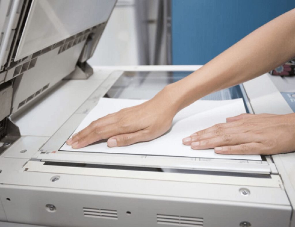 Các nguyên nhân và cách khắc phục máy photocopy bị mờ 1 bên